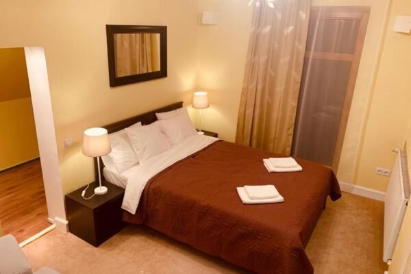 villa-alma-guesthouse-bedroom-sigulda Aina is a cozy budget guesthouse exterior and bedroom in Sigulda